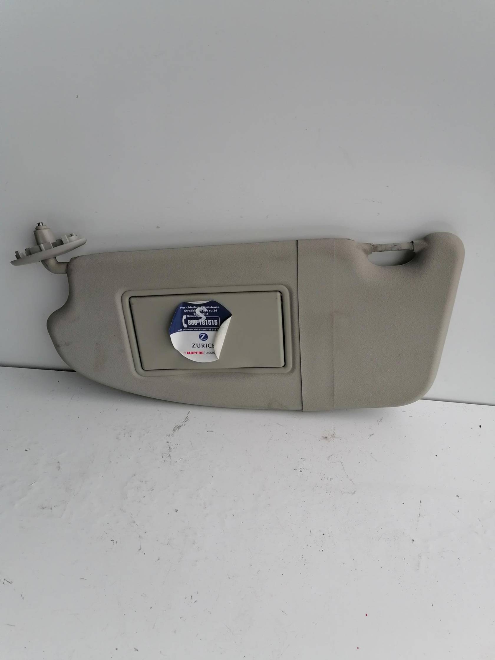 Aletta parasole parabrezza sx.